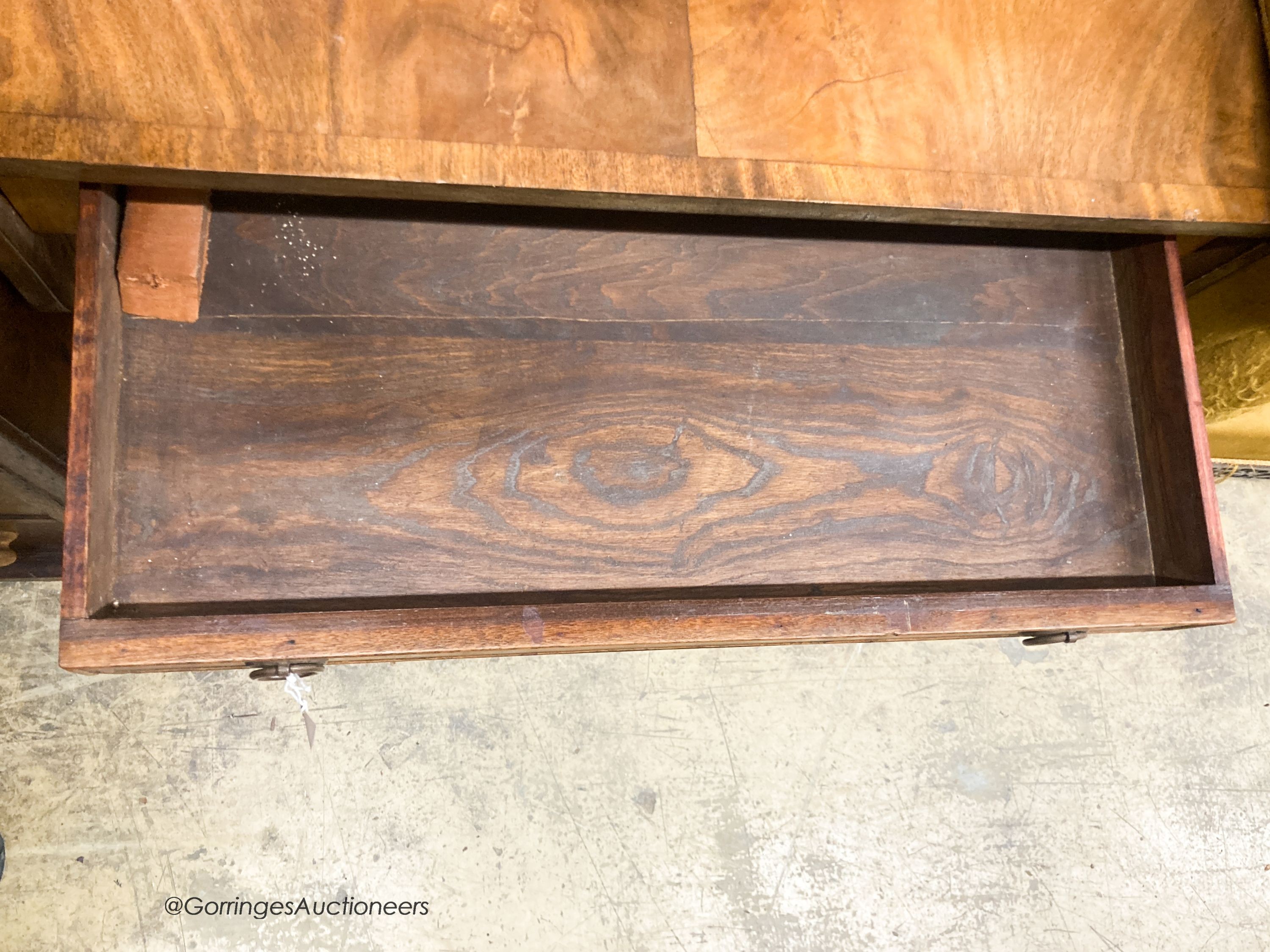 A 1920's reproduction mahogany sofa table, W.74cm H.47cm H.73cm